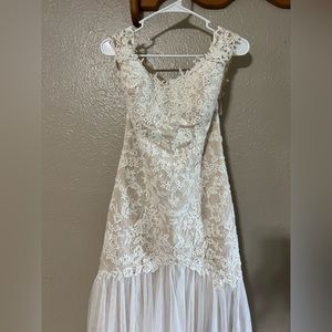 Size 14 wedding dress. Only worn once.